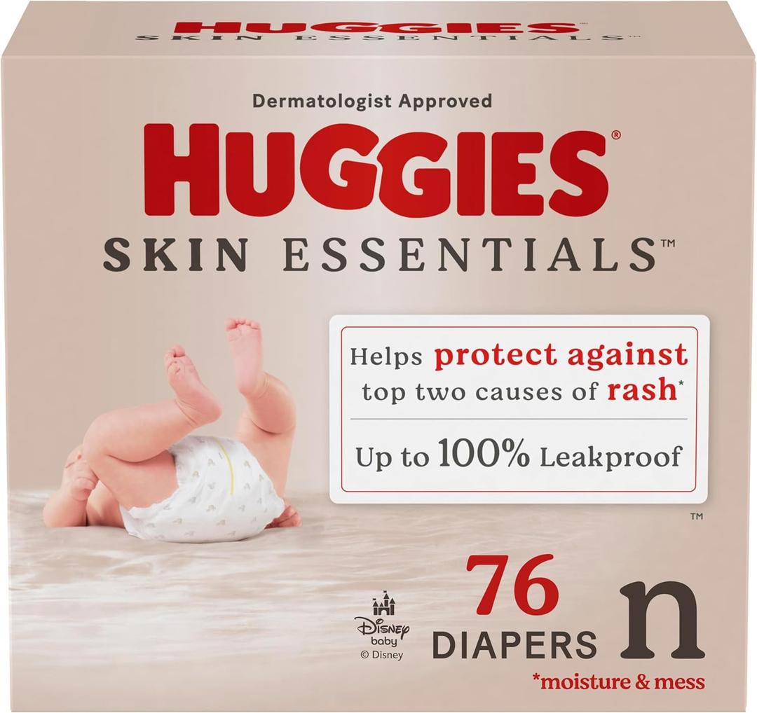 Huggies Size Newborn Diapers, Skin Essentials Baby Diapers, Size Newborn (6-9 lbs), 76 Count, Packaging May Vary