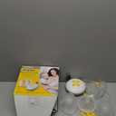 Medela Swing Maxi Hands-Free Double Electric Breast Pump, Easy and Intuitive Design for On-the-Go, Compatible with Medela Family App