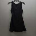 QINSEN Womens Open Back Tennis Dress Sleeveless Built in Shorts Golf Athletic Dress with Pockets (Small, Black)