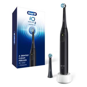 Oral-B Rechargeable Electric Toothbrush, iO2 Starter Kit, 3 Cleaning Modes, Automatic Pressure Sensor to Protect Gums, 2 Brush Heads, Night Black