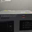 Farberware 1.1 Cu. Ft. Countertop Microwave Oven – 1000 Watts Power, Auto Cook Settings, Defrost, Easy Clean and Child Safety Lock - Black