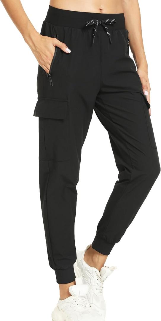 Kcutteyg Womens Water Resistant Hiking Pants with Pockets Quick Dry Soft Athletic Workout Joggers Pants for Camping Travel (Medium, Dark Black) Kcutteyg Womens Water Resistant Hiking Pants with Pockets Quick Dry Soft Athletic Workout Joggers Pants for Camping Travel (Medium, Dark Black)