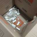 WHITE BABY CAGE ASSEMBLY KIT, WITH LOOSE PARTS.