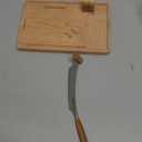 BOSKA Cheese Cutter Lumberjack Amigo/Serving Board with Cheese Knife/Beechwood and Stainless Steel/For Cheese and Sausage/Safe Cutting/With Crumb Catcher / 9 Inches