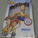 Mattel Disney and Pixar Toy Story Large Action Figure, Posable Woody Collectible in Signature Sheriff Look with Removable Hat, 12-inch Scale, 12.25 inch