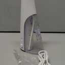 Waterpik Cordless Pulse Rechargeable Portable Water Flosser for Teeth, Gums, Braces Care and Travel with 2 Flossing Tips, Waterproof for Shower, ADA Accepted, WF20 White, Packaging and Tips May Vary