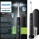 Philips Sonicare ProtectiveClean 5300 Rechargeable Electric Toothbrush, with Pressure Sensor, 3 Cleaning Modes, SmarTimer and QuadPacer, with 2 Bonus Brush Heads, Travel Case, Black, Model HX6423/34