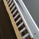 Regalo Safety 56-Inch Extra Wide Baby Gate for Doorways, Hallways & Bottom of Stairs, Pressure Mount Safety Gate for Babies, Toddlers & Pets, Tested & Safe, American Designed, Family Owned (White)