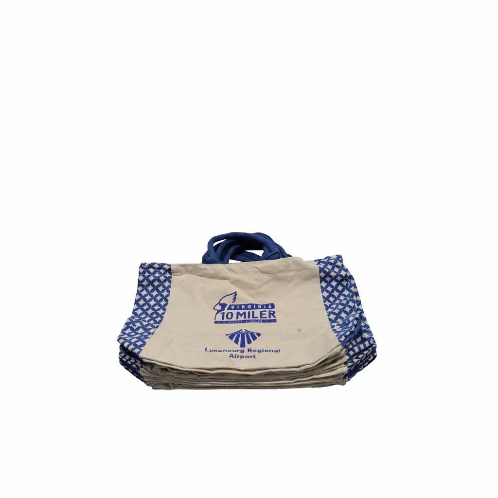 7 large tote bags, beige, blue straps, blue logo, pattern