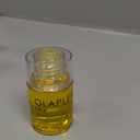 Olaplex No. 7 Bonding Oil, Concentrated High Shine Heat Protectant | Visibly Smooths & Softens Hair | Added Color Vibrancy | Up to 72 Hour Frizz Control | For All Hair Types | 1 fl oz