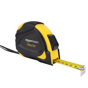 Amazon Basics Self-Locking Tape Measure with Belt Clip, 33 feet (10 m), Inch/Metric Scale, MID Accuracy, Black, Yellow