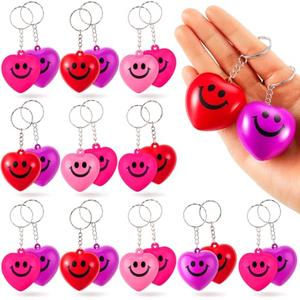 Quelay 24 Pcs Valentine's Day Heart Stress Balls Keychain Bulk, 4''x2'' Smile Face Squeeze Balls, Heart Shaped Foam Gifts for Valentine Student Rewards Classroom Boys Girls Adults(Mixed Color)