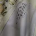 OYOANGLE Women's Strappy Beaded Halter Monokini Cutout Backless One Piece Swimsuit Cheeky Beach Leotard (Medium, Beige)