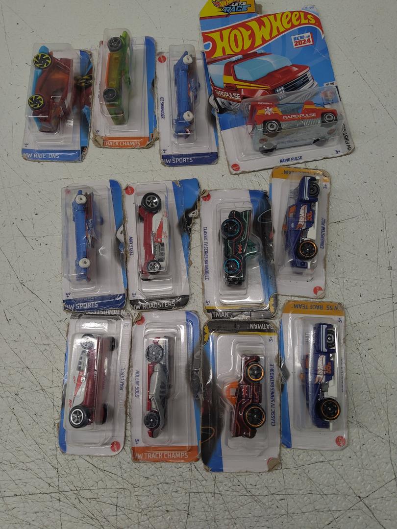 Hot Wheels 12 Pack, Kick Kart, Mach It Go, 2 Ice Shredder, Rapid Pulse, 2 Max Steel, 2 Classic TV Series Batmobile, Erikenstein Rod, Rollin' Solo, Mod Rod