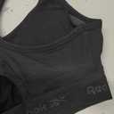 Reebok High Speed Women's Medium Impact Sports Bra - with Removeable Cups & Elastic Hem Band (Black, S)