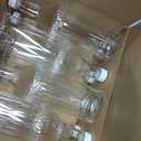 Noamus 8 Pack 33 oz Plastic Soda Bottles with Caps, 1L Reusable Empty Clear PET Juice Container, Disposable Wine Bottles with White Lid for Drinking Beverage Water Liquor Beer Milk Smoothies