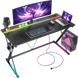 TIQLAB Gaming Desk with Power Outlets & LED 47 Inch Ergonomic Computer Carbon Fiber Surface Gamer Desk, PC Workstation with Headphone Hook for Bedroom, Kids Desk Gift for Boys, Black
