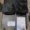 Travel Compression Packing Cube Set by the Brand Bagail. The carry bag is black and there are 8 total various packing bags of different sizes from a zip pouch to a cube the size of 18"x14"x5".
