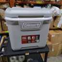 Coleman Classic Series Insulated Portable Rolling Cooler with Wheels, Leak-Resistant Outdoor Hard Cooler Keeps Ice up to 5 Days, 65-Quart, 65qt