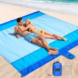 PTEROMY Beach Blanket Waterproof Sandproof, 84" X 84"Extra Large Beach Mat with Storage Bag, Quick Drying Lightweight, 6 Stakes, Accessories for Picnic, Travel (7x7 FT, Blue)