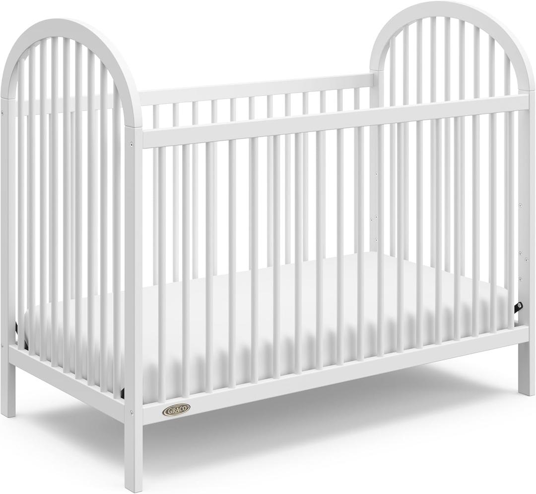 Graco Olivia Convertible Crib (White)  GREENGUARD Gold Certified, 100% Solid Wood, Fits Standard Crib Mattress, Converts to Toddler Bed and Daybed, 4 Adjustable Mattress Heights