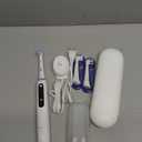 Oral-B iO Deep Clean + Whiten Rechargeable Electric Toothbrush with Visible Pressure Sensor, 2 Minute Timer, 5 Cleaning Settings, 1 iO5 Limited, 3 Toothbrush Heads, Travel Case & Refill Holder, White