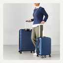Amazon Basics 2-Piece Hardside Luggage Set (21", 30"), Expandable, Scratch-Resistant Finish, Telescoping Handle, Four Multi-directional Wheels, Navy Blue