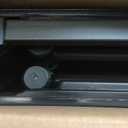 Amazon Basics Portable 4 Ft Rectangular Folding Dining Table, 4 Adjustable Height Settings, Space Saving Fold-in-Half Design and Carrying Handle, Indoor & Outdoor, Washed Black, 47.8 x 23.9 x 33.9 in