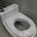 Fisher-Price 2-N-1 Potty Trainer with Flushing Sounds, Chart & Storage  White Floor Potty Chair with Splash Guard, Removable Ring & Bowl, Patented Snap Safe Ring Technology