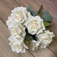 9 Pack Of Plastic Roses White