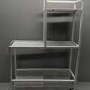 White, Metal Clothing Rack or Storage Cart With Shelves and a Hanging Bar, Size 31x22x9 Inch