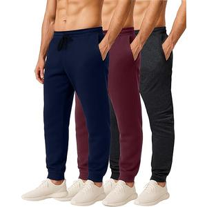 Real Essentials 3 Pack: Men's Cotton Fleece Jogger Sweatpants - Athletic Pants Bottoms with Pockets  Size 3XL,  Black Blue and Red