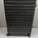 Amazon Basics 30" Hardside Large Checked Luggage, Hardshell Suitcase With Four Multi-directional Wheels, Expandable For Up to 15% More Space, Scratch-Resistant Shell, Black