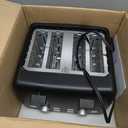 Amazon Basics 4 Slice Toaster, With 7 Browning Settings, Extra Wide Slots For Bagels and Special Breads, Removable Easy-to-Clean Crumb Trays, Cancel/Defrost/Bagel Buttons, 1500W, Black & Silver