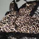 OYOANGLE Women's Cheetah Print Satin Lingerie Bodysuits Leopard Lace Trim Criss Cross Teddy Babydolls (Medium, Brown)