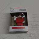 Hallmark Peanuts Snoopy on Holiday Doghouse Christmas Ornament