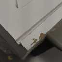 Kate and Laurel Cates Modern Farmhouse Decorative Wood Wall Storage Shelving Cabinet with Sliding Barn Door, Rustic White (22x28)