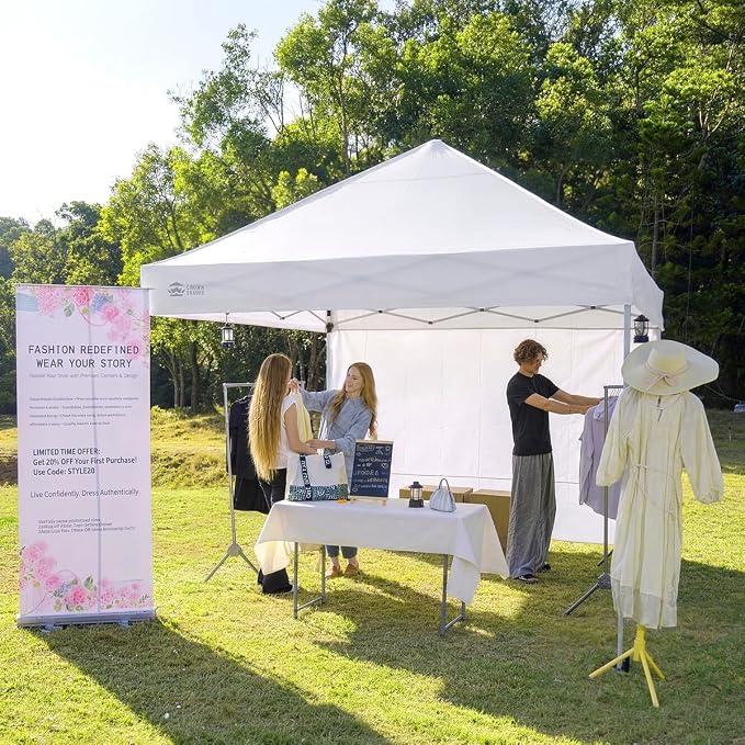 10 x10 Commercial Pop Up Canopy Tent with 1 Side Wall, White
(Garment Hanging Bar NOT included)Patented Centerlok One Push Setup, Heavy Duty Vendor Tent with Wheels, STO-N-Go Bag