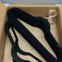 SONGMICS Velvet Hangers 50 Pack, Non-Slip with Rose Gold-Colored Swivel Hooks, Slim Space-Saving for Closet, Heavy-Duty, Black UCRF026B50