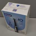 Oral-B Rechargeable Electric Toothbrush, iO3 Limited Deep Clean, 3 Cleaning Modes, Visual Pressure Sensor to Protect Gums, 2 Brush Heads, Travel Case, Black (1 Count (Pack of 1)