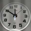 WallarGe Night Light Wall Clock for Bedroom - Silent Lighted up Wall Clock Glow in The Dark, Battery Operated Wall Clocks for Living Room/Kitchen, Easy to Read Large Digital Display, 12 Inch (Silver)