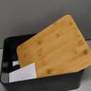 ZICOTO Beautiful Bread Box With Wooden Lid For Your Kitchen Countertop - Spacious Container Perfectly Stores Your Homemade Bread, English Muffins & Bagels - Quality Cutting Board Lid Keeps Loaf Fresh (Black)