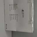 LEIVI Electric Bidet Toilet Seat with Wireless Remote and Side Panel, Multiple Spray Modes, Adjustable Heated Seat, Warm Water and Air Dryer, Auto LED Nightlight, Round (Silver)