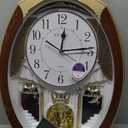 Musical Motion Chime Wall Clock with Rotating Pendulum, Decorative Wall Clock, 18 Melodies, for Home, Hotel, Library or Church Decor.