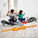Hot Wheels Toy Car Track Set, Formula 1 Grand Prix Circuit Track Set with 3 1:64 Scale Die-Cast Toy Cars, Two Modes of Racing with a Motorized Booster
