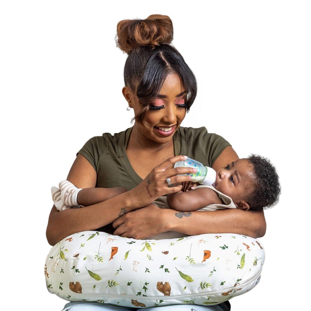 Boppy Nursing Pillow - Firm, Ergonomic U-Shaped Bottle and Breastfeeding Pillow with High Lift for Comfort and Support, Spacious Surface - Neutral Plants and Animals