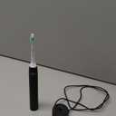 Philips Sonicare 4100 Rechargeable Electric Toothbrush, with Pressure Sensor, 2 Intensity Settings, SmarTimer and QuadPacer, 14-Day Battery Life, Black, Model HX3681/24
