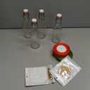 Nuogo 8 Pcs Swing Top Glass Bottles For Kahlua Extract Homemade 8oz 8 Pcs Labels Clear Flip Top Glass Beer Bottles with Caps and Cotton Twines for Home vanilla Beer Kombucha Soda Fermentation Supply