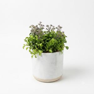 Artificial flowers in a pot