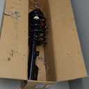 Monroe Quick-Strut 172950 Suspension Strut and Coil Spring Assembly for Jeep Patriot